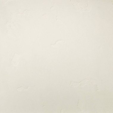 Dokulu arka plan. Dekoratif alçı duvarlar, dış cephe dekorasyonu. Bej rengi