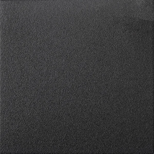 Black background grainy metal texture — Stock Photo, Image