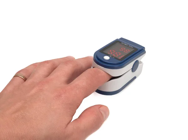 パルス速度および酸素濃度を測定するために使用されるパルス酸素濃度計 — ストック写真