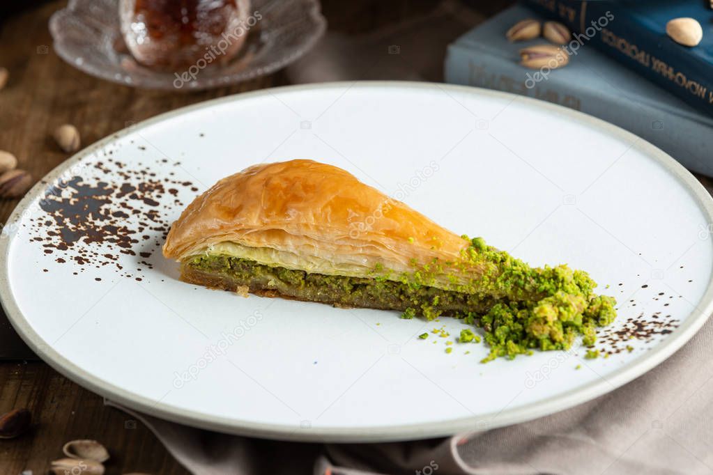 Piece of turkish baklava with pistachio