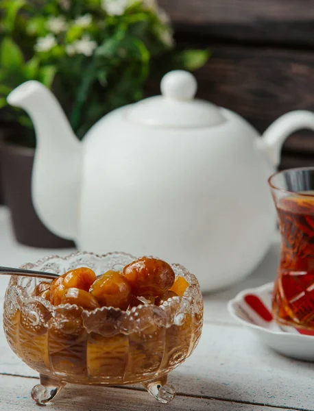 close up of mini apple jam in crystal cup for azerbaijani tea setup