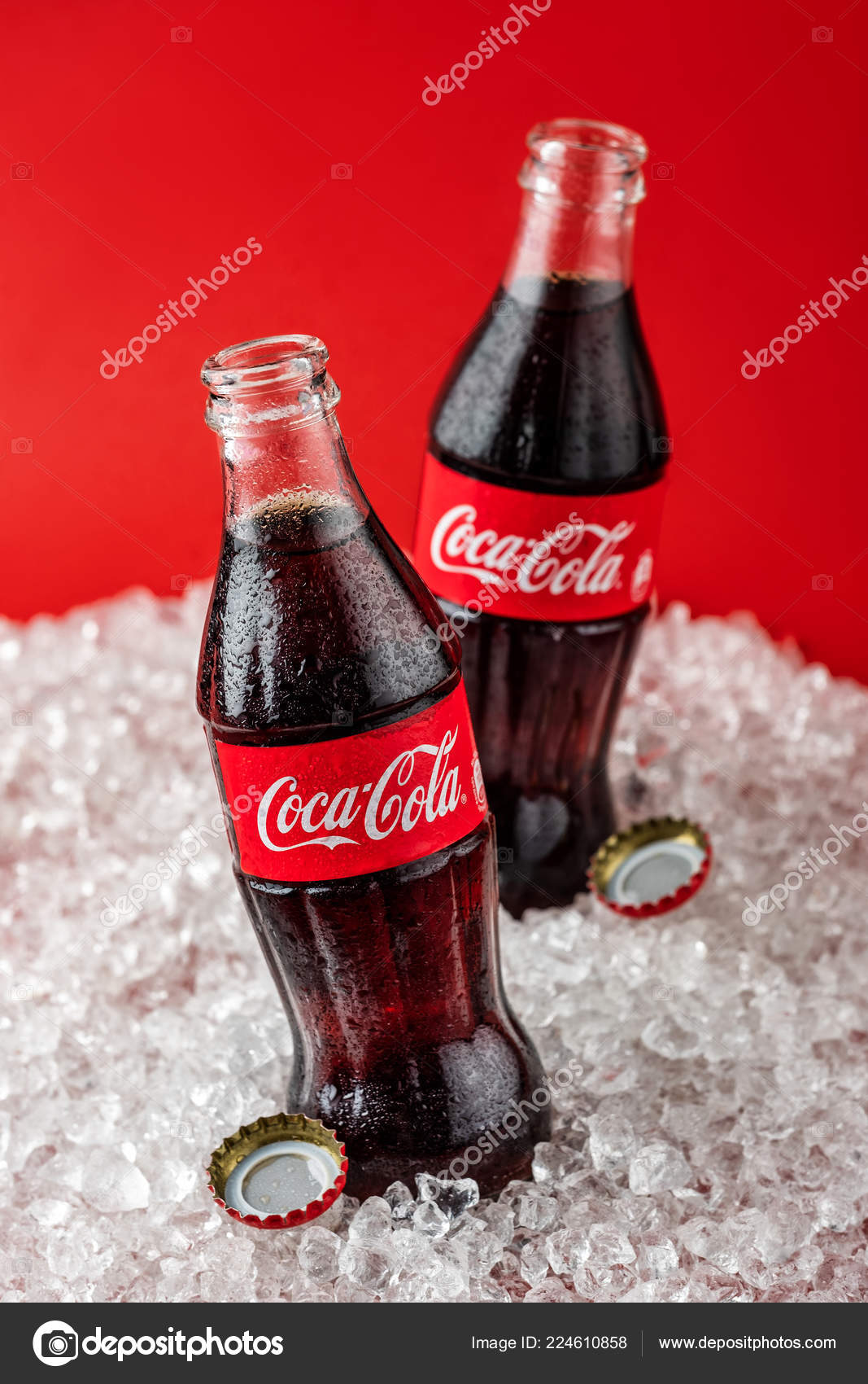 Coca Cola with Ice, Bottle, Glass, Cup Editorial Stock Photo