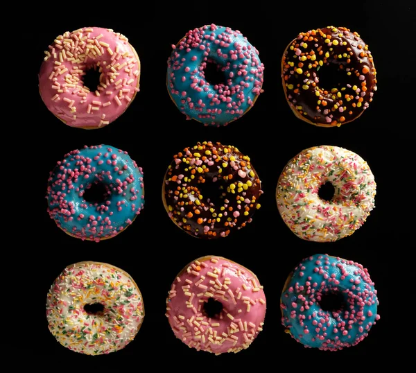 Variety Colorful Tasty Glazed Donuts Black Background — Stock Photo, Image