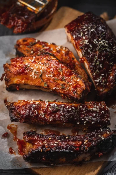 Smoked Roasted pork ribs. Closeup of Barbeque spicy ribs.