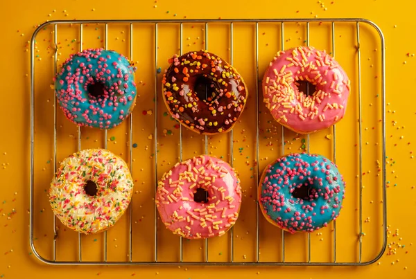 Variety Colorful Tasty Glazed Donuts Colored Background — Stock Photo, Image