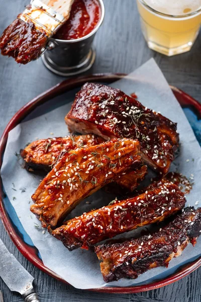 Smoked Roasted pork ribs. Barbeque spicy ribs. Traditional american BBQ food. Top view.