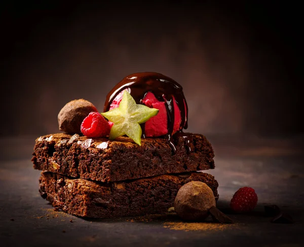 Chocolate Brownie with Chocolate Ice Cream and Fruit.