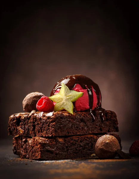 Chocolate Brownie with Chocolate Ice Cream and Fruit.