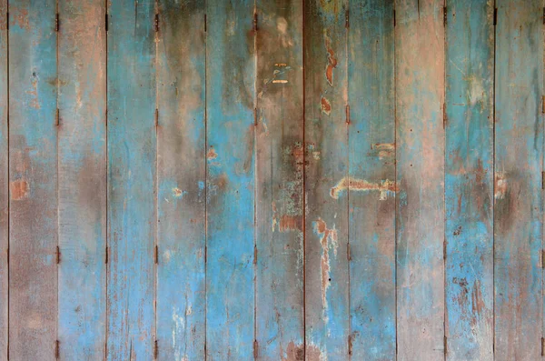 Eski ve kirli mavi ahşap kapı. Ahşap kapı arka plan dokusu. Duvar ve kapı dekorasyonu ve tasarımı.