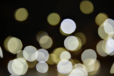 Defokus ışıkları soyut bokeh arka plan. Mutlu Noeller ve Yeni Yıl arka plan. Tatil parlayan arka plan ve duvar kağıdı. Bulanık Bokeh.