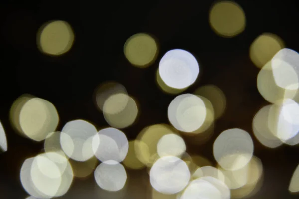 Defokus ışıkları soyut bokeh arka plan. Mutlu Noeller ve Yeni Yıl arka plan. Tatil parlayan arka plan ve duvar kağıdı. Bulanık Bokeh.