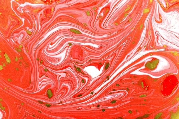 An orange marbling art pattern - great for abstract textile prints, background and wallpaper