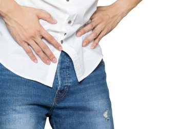 Erkek pantolon ile prostat iltihabı, prostat kanseri, Erkekler Sağlık kavramı üzerinde beyaz izole orta kasık üzerinde tutan eller.