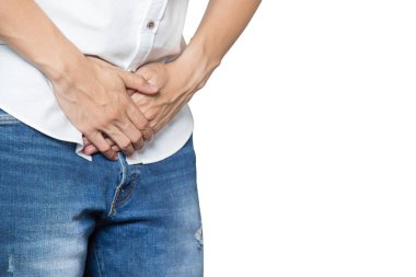 Erkek pantolon ile prostat iltihabı, prostat kanseri, Erkekler Sağlık kavramı üzerinde beyaz izole orta kasık üzerinde tutan eller.