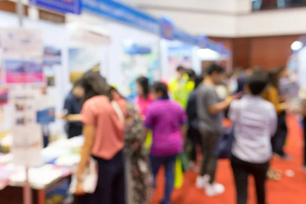 Abstract blurred event exhibition with people background, business convention show concept.