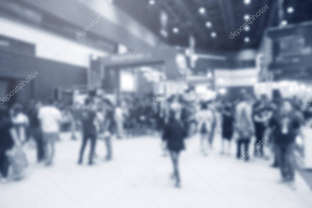 Abstract blurred event exhibition with people background, business convention show concept.