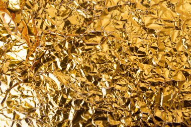 Altın buruşuk folyo kağıt doku arka plan.