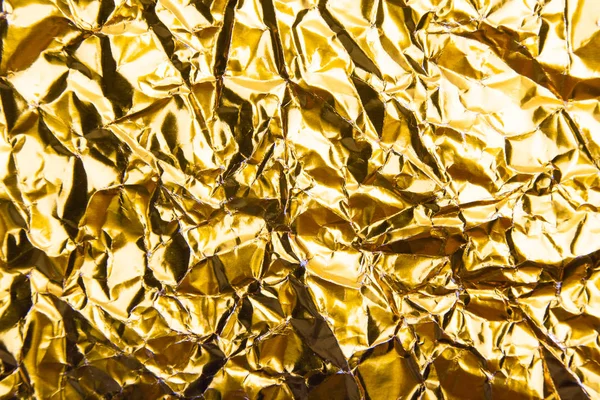 Oro Increspato Carta Stagnola Texture Sfondo — Foto Stock