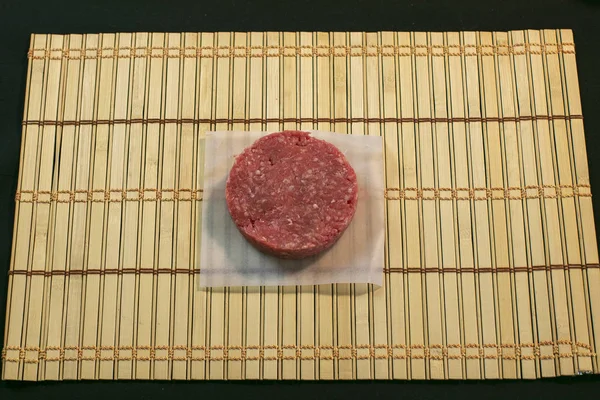 Raw ground beef burger patty — Stock Photo, Image