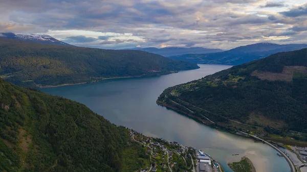 Sunset over river Stryneelva and Loen village at Stryn, Norway, július 2019. — Stock Fotó