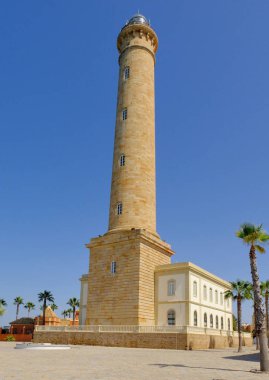 Stone lighthouse in Chipiona in Andalusia in Spain in october.