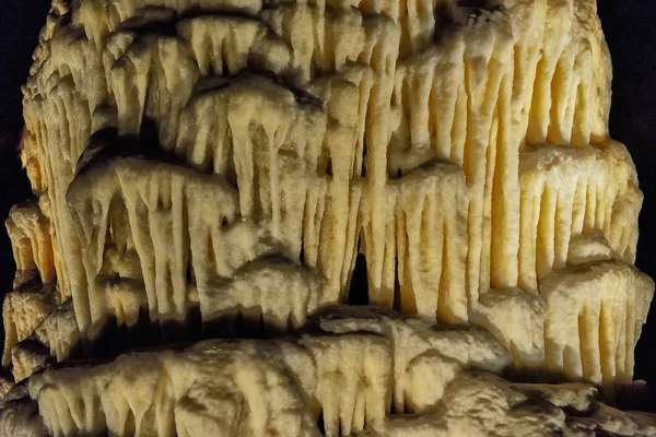 under the ground. beautiful view of stalactites and stalagmites in an underground cavern - Postojna cave, Slovenia, Europe