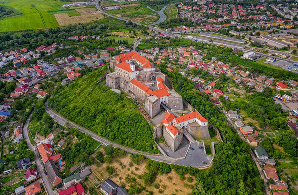 Beautiful panoramic aerial view to Palanok Castle in the city of Mukachevo. June 2020