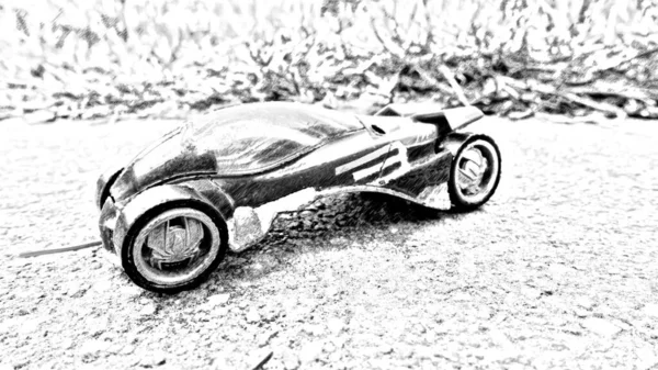 Computerized black and white drawing representing a custom race car