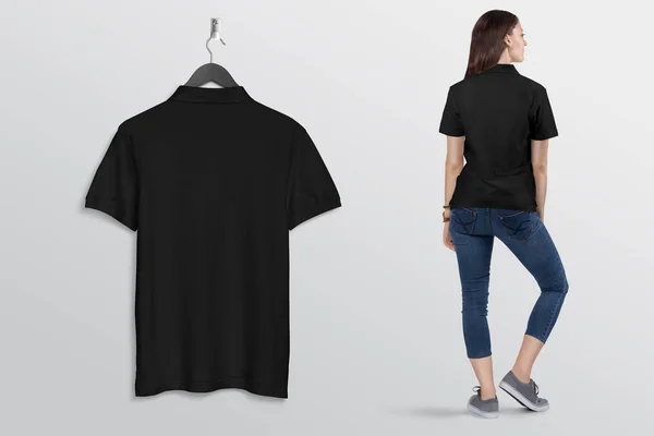 Opknoping Zwarte Effen Polo Shirt Aan Muur Met Mooi Vrouwelijk — Stockfoto