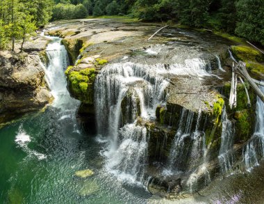 Stunning aerial photos of Lower Lewis River Falls on the majestic Lewis River in Skamania County and the Gifford Pinchot National Forest in Washington State clipart