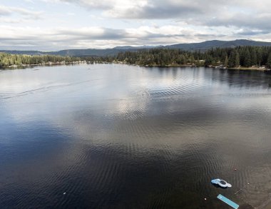 Amazing aerial shots of gorgeous Clear Lake in Pierce County Eatonville, Washington clipart