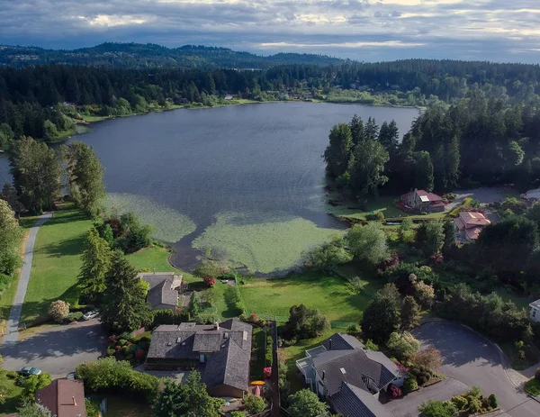 Picturesque Phantom Lake and the surrounding sprawling communities of Robinswood, Lake Hill and West Lake Sammamish in Bellevue, Washington.