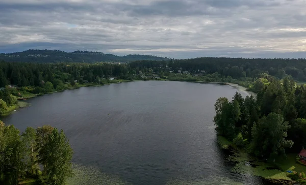 Picturesque Phantom Lake and the surrounding sprawling communities of Robinswood, Lake Hill and West Lake Sammamish in Bellevue, Washington.