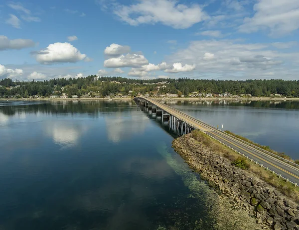 Outstanding aerial photography of the picturesque Fox Island Bridge connection Gig Harbor and Fox Island in the state of Washington.