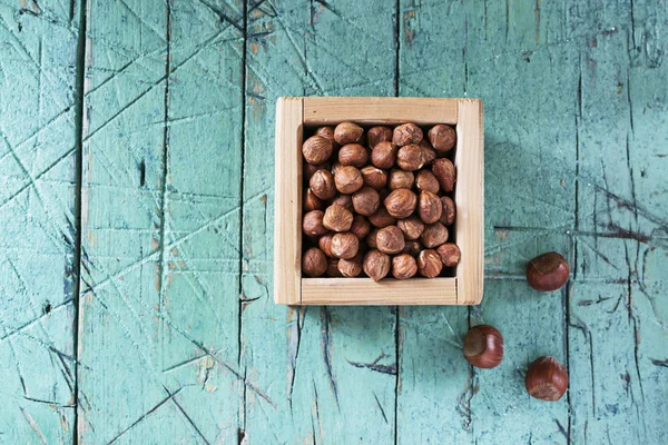 Hazelnuts Wooden Box Old Cyan Table Copy Space — Stock Photo, Image