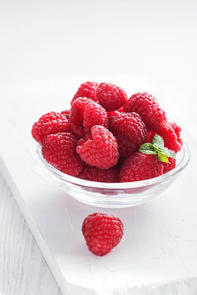 Fresh Raspberries Glass Bowl White Wooden Board Copy Space Selective — Stock Photo, Image