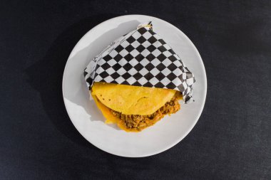 top view arepa on a dish. Black and white dessign clipart