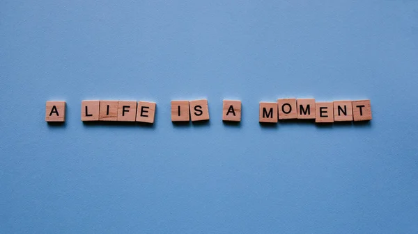 Words Life Moment Blue Paper Background Motivating Web Banner — Stock Photo, Image