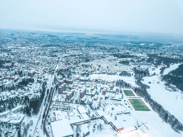 Oslo city snow covered, soccer fields above the snow