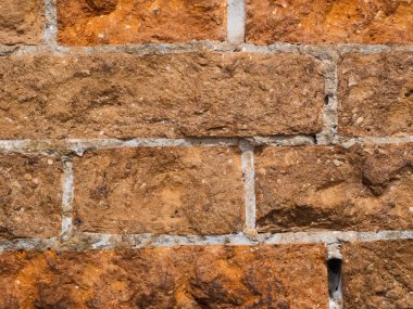 eski yıpranmış tuğla kabarık beton harç ile dokulu. Arka plan