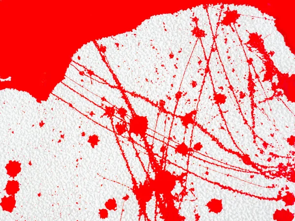 Red blot and splatter paint on white background — Stock Photo, Image