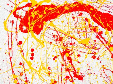 beyaz bir arka planda kırmızı ve sarı boya sıçramaları