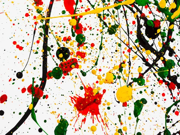 splashes on red and black and green and yellow paint