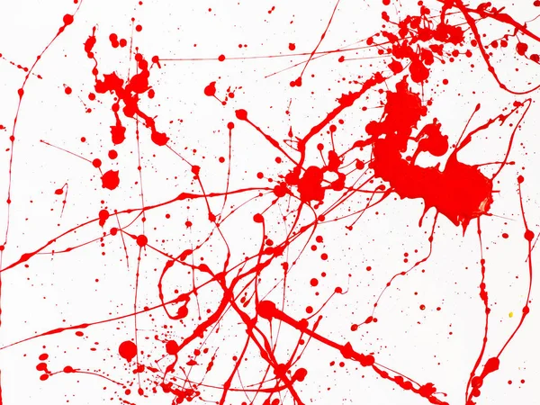 Peinture rouge gouttes et éclaboussures sur fond blanc — Photo