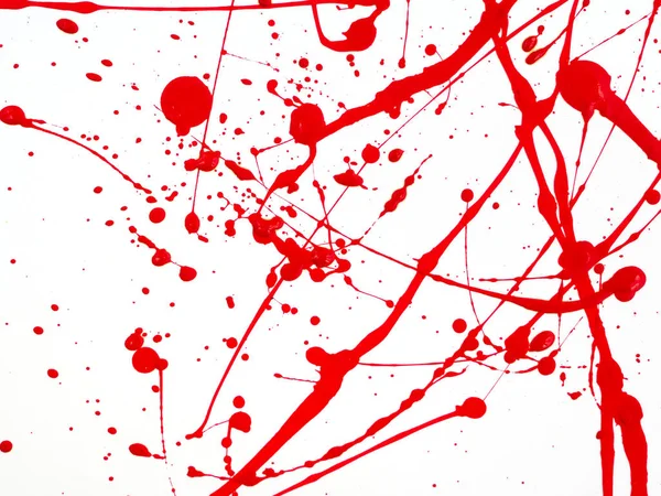 Tinta vermelha gotas e respingo no fundo branco — Fotografia de Stock