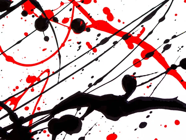 红色和黑色油漆滴和飞溅在白色背景 — 图库照片