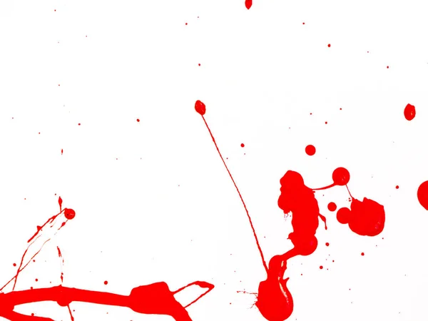 Red Paint gocciola e spruzza su sfondo isolato bianco — Foto Stock
