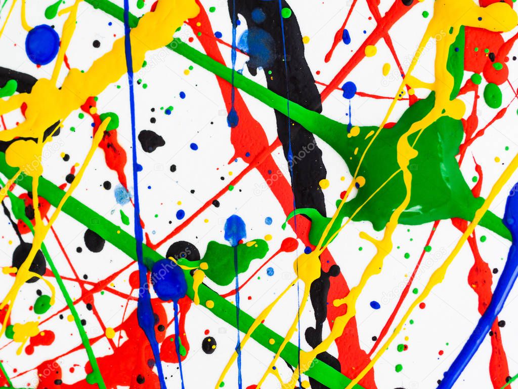 Abstract expressionism art creative background. art of splashes and drips . red black green yellow blue paint on white background.