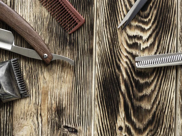 Barber Tools On Wooden Background