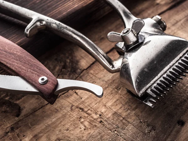 barber tools. vintage clipper straight razor. hairbrush.